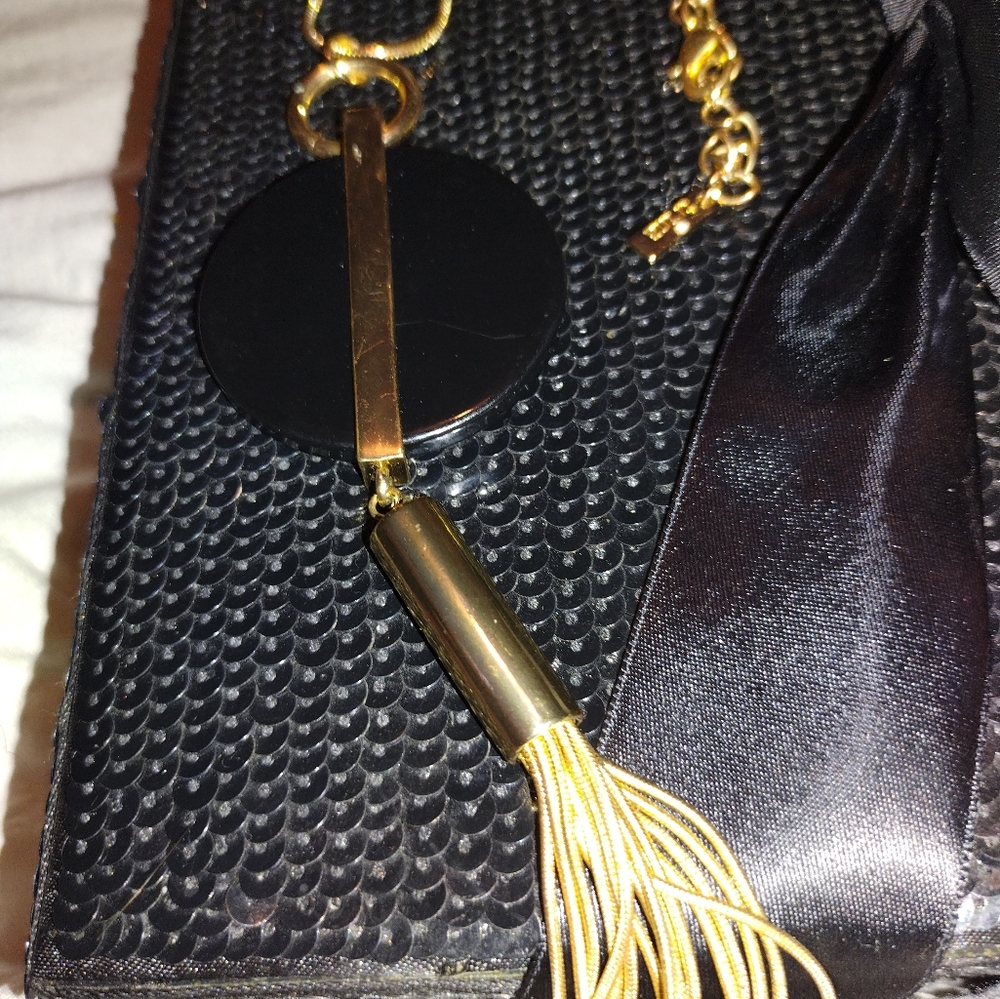 Trina Turk gold and black geometric shape necklace with gold Fringe